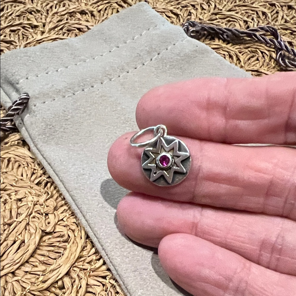 Silver and Brass Star Pendant with Pink Gemstone